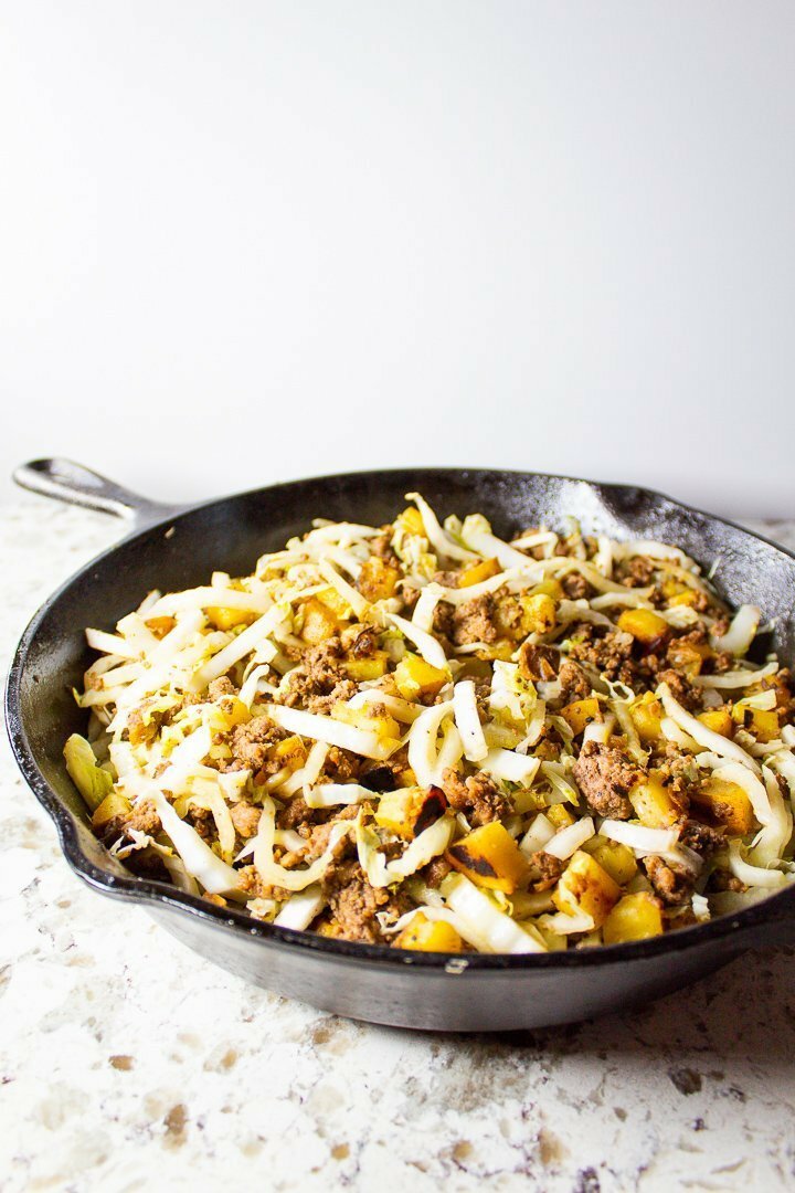 This super easy One-Pan Ground Beef Breakfast Hash requires just four ingredients and makes a deliciously satisfying Paleo, Whole30 or AIP breakfast (or lunch or dinner). Plus, it's ready in 30 minutes flat, so you can fuel up and get on with your day! | HurriedHealthnut.com