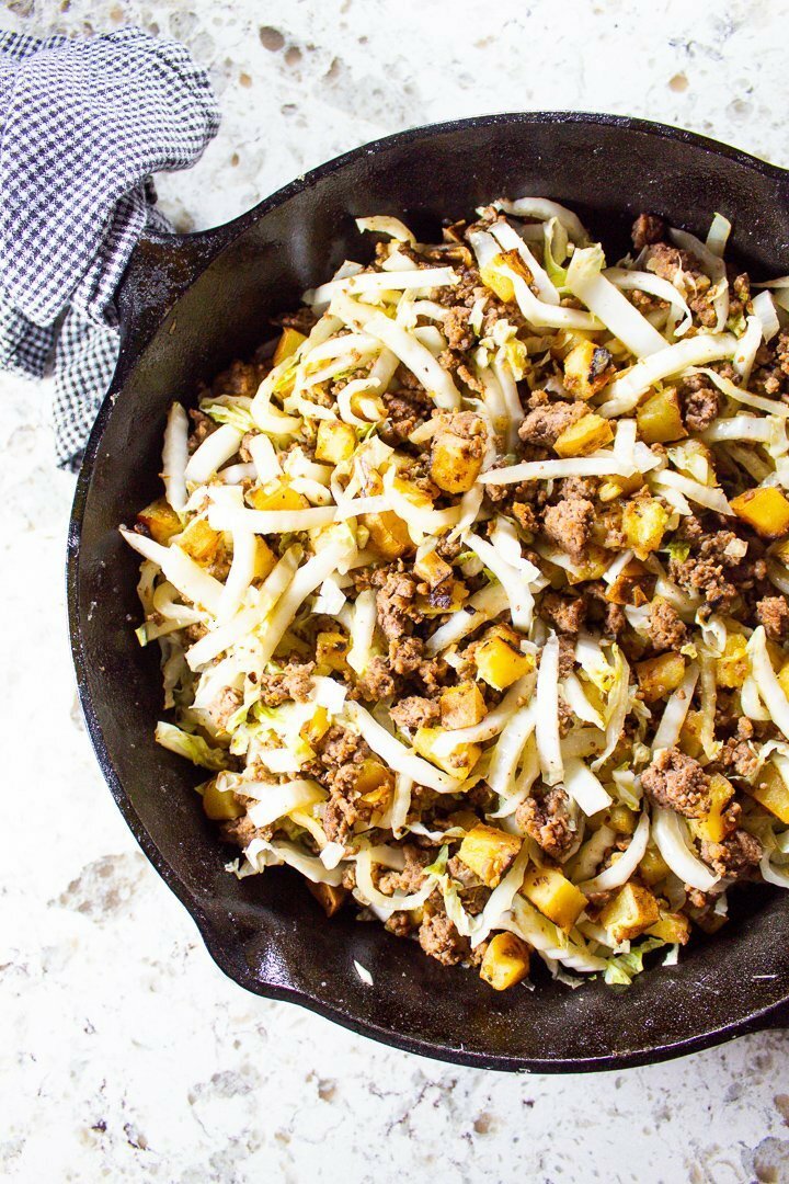 This super easy One-Pan Ground Beef Breakfast Hash requires just four ingredients and makes a deliciously satisfying Paleo, Whole30 or AIP breakfast (or lunch or dinner). Plus, it's ready in 30 minutes flat, so you can fuel up and get on with your day! | HurriedHealthnut.com