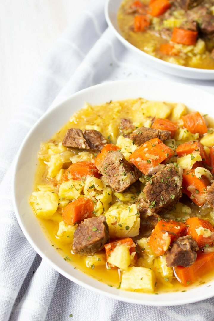 Close up of AIP Irish Beef Stew in a white bowl.
